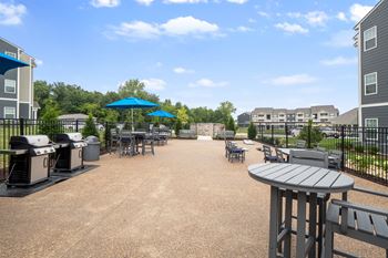 A sunny day at the outdoor seating area of a building.